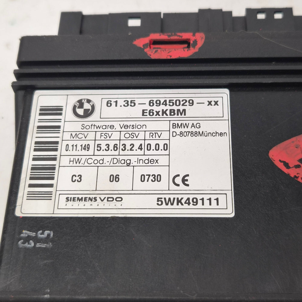 Module KBM / Boîtier Confort BMW E60 E61 – Ref. 6945029 – Occasion Garantie 3 Mois
